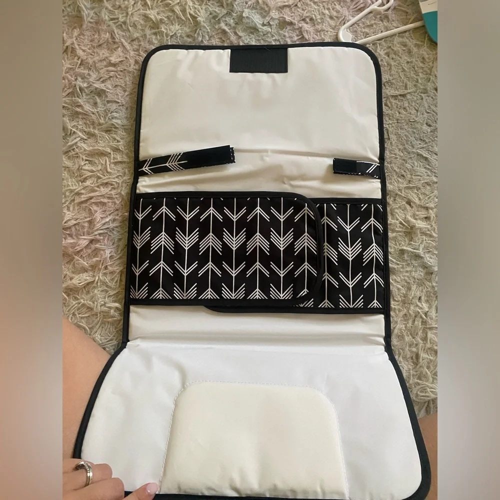Portable changing pad